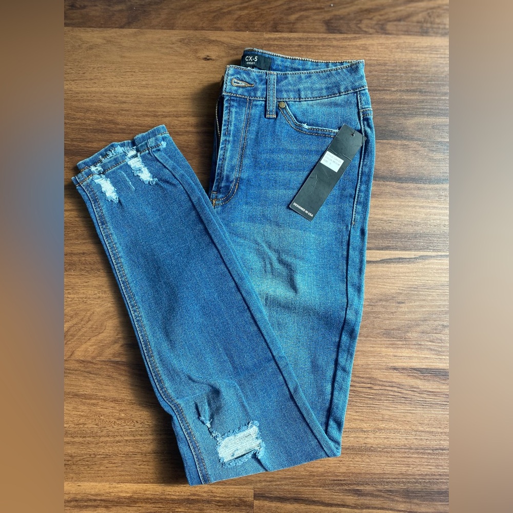 Distressed Blue Jeans